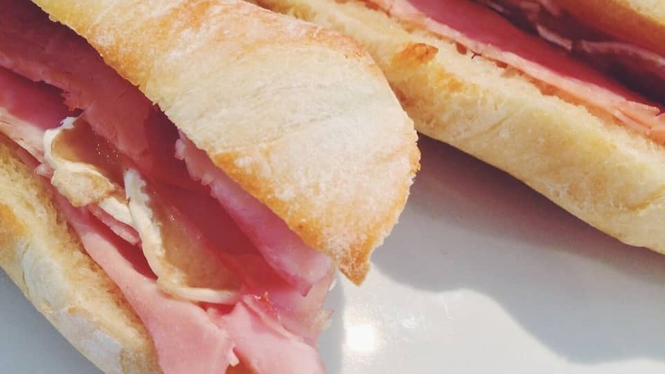 Hidden gem on Grand Ave is Chez Arnaud, the best French bakery/sandwich/coffee in St. Paul. This is the ham and melted Brie sandwich on a traditional buttery baguette, made warm and crisp in a toaster oven. Pairs nicely with macchiato. #lunchtime