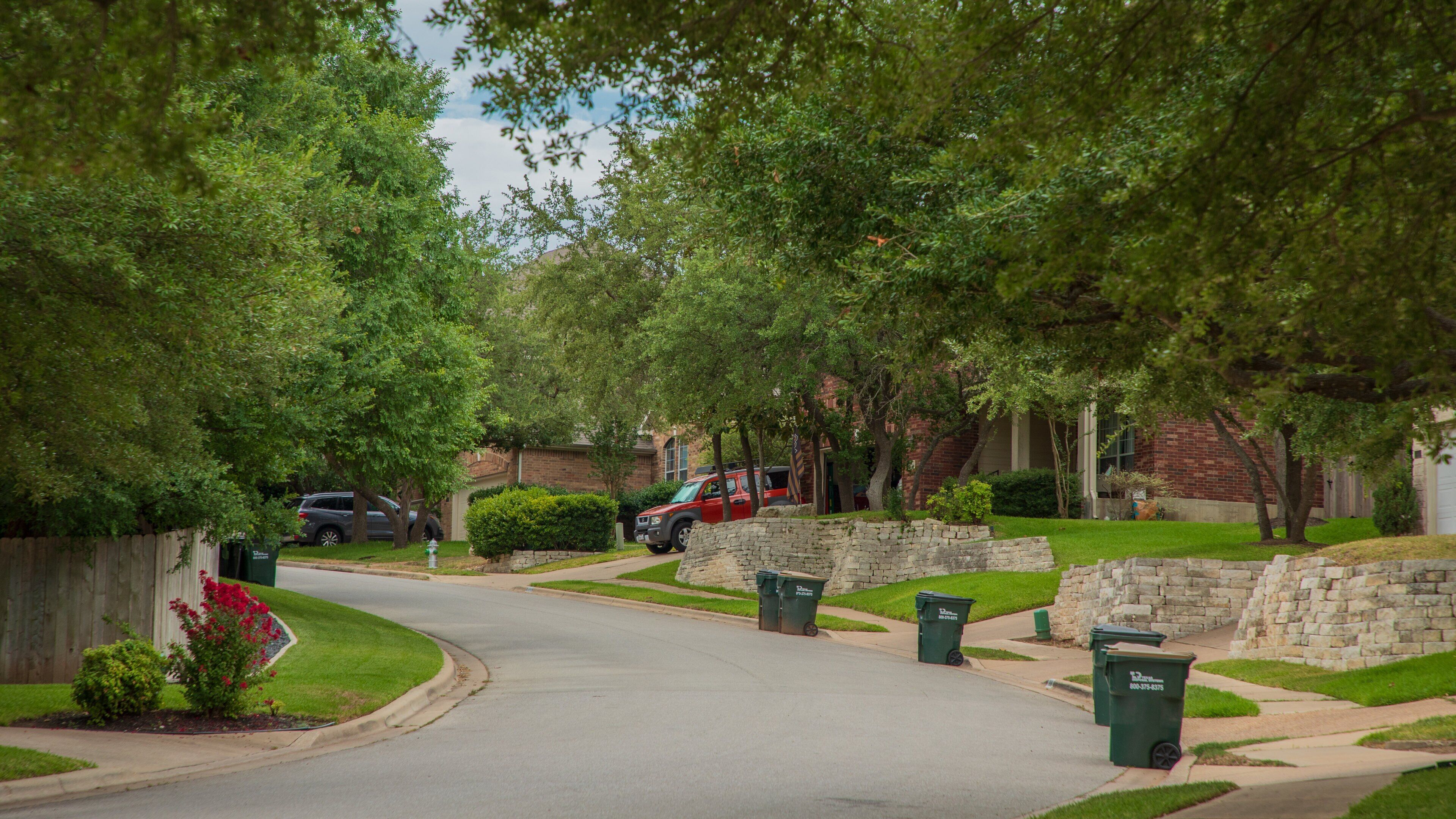 Steiner Ranch showing a house and a small town or village