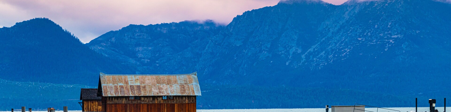 Cloudy Sunset Over Piers and Boathouse on Eldorado Beach, South Lake Tahoe, California, USA