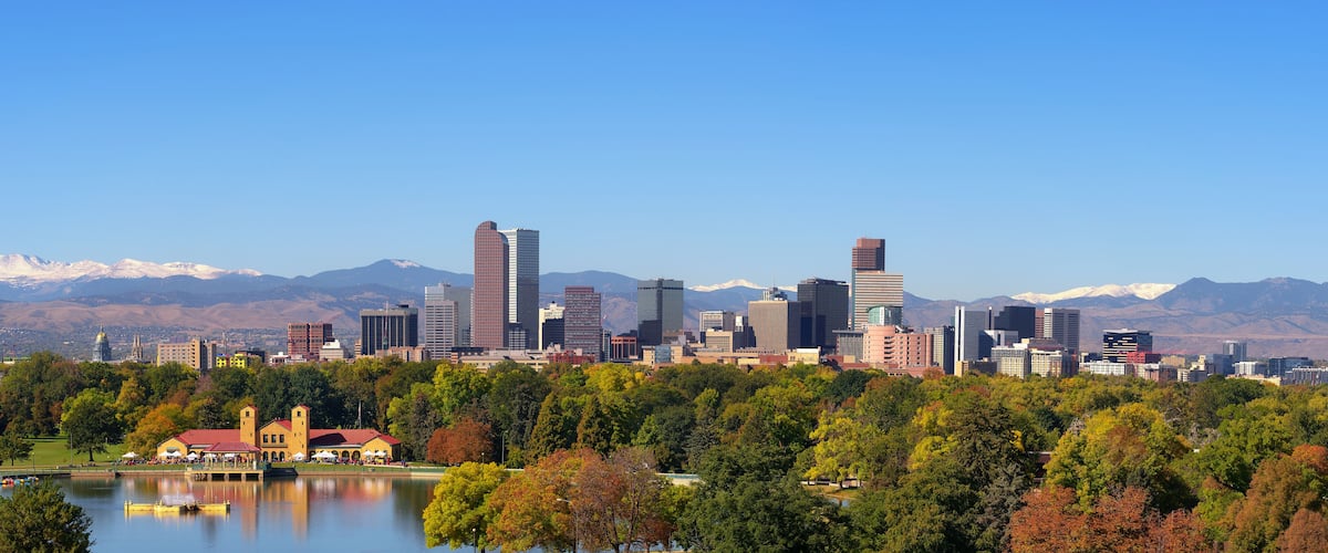 Skyline of Denver downtown with Rocky Mountains
