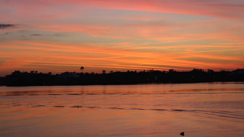 Beautiful Florida Sunset over the North Causeway River in New Smyrna Beach.