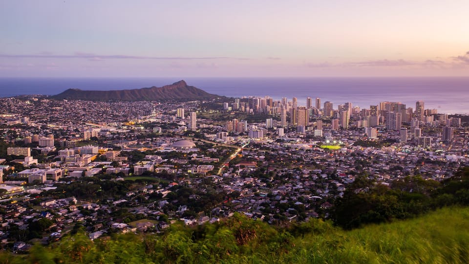 Makiki - Lower Punchbowl - Tantalus showing landscape views, a sunset and a city