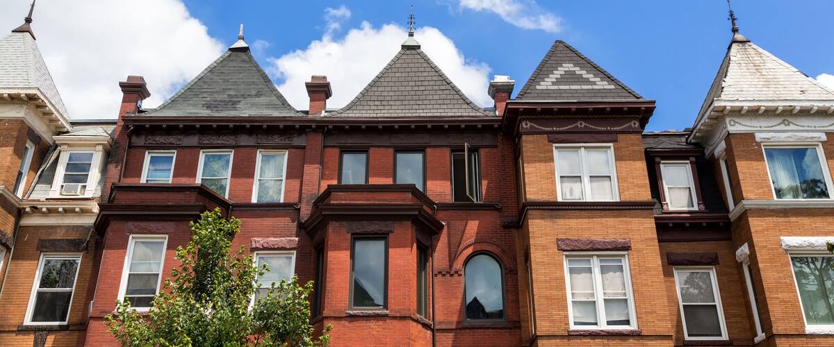 Row houses in the Washington DC neighborhood of Bloomingdale on a summer day.