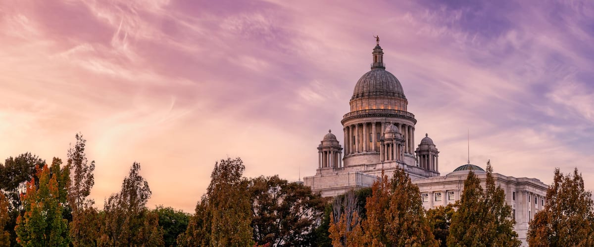 Panoramic view of Rhode Island State House. Historic Building in a modern city. Sunset Sky Art Render. Located in Downtown Providence, Rhode Island, United States.