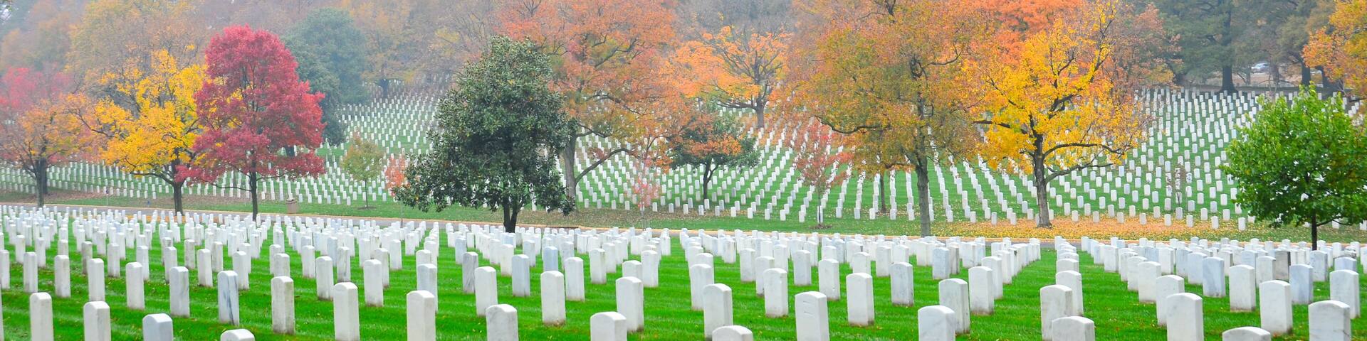 Gravestones in Arlington National Cemetery in autumn foliage - Washington D.C. United States of America