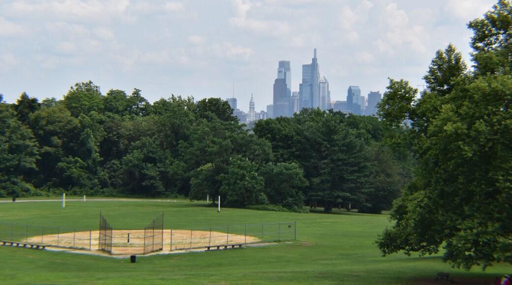 Philadelphia, PA, USA -July 15, 2021: View of the Philadelphia, PA Skyline from Belmont Plateau, Fairmount Park with a Softball Field in the Foreground