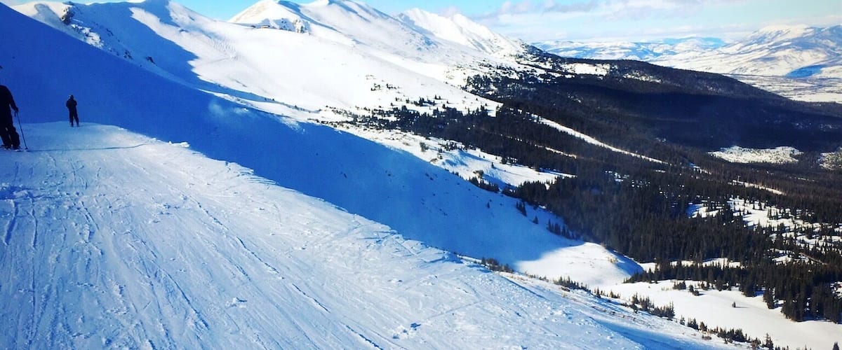 At the peak of Breckendridge ski resort. Some fantastic spots to drop in and touch down in fresh, deep powder here to the far left, just a small hike to get there. Definitely a great place to trek to when the mountain is busy.