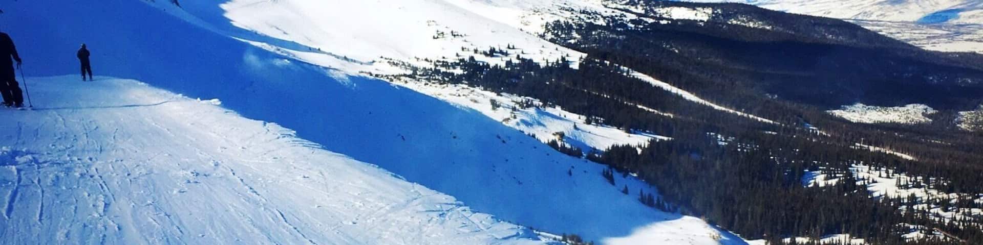 At the peak of Breckendridge ski resort. Some fantastic spots to drop in and touch down in fresh, deep powder here to the far left, just a small hike to get there. Definitely a great place to trek to when the mountain is busy.