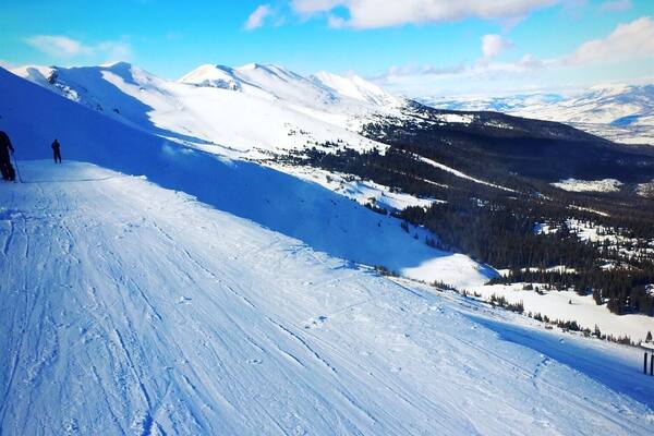 At the peak of Breckendridge ski resort. Some fantastic spots to drop in and touch down in fresh, deep powder here to the far left, just a small hike to get there. Definitely a great place to trek to when the mountain is busy.