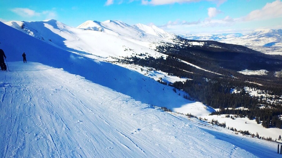At the peak of Breckendridge ski resort. Some fantastic spots to drop in and touch down in fresh, deep powder here to the far left, just a small hike to get there. Definitely a great place to trek to when the mountain is busy.