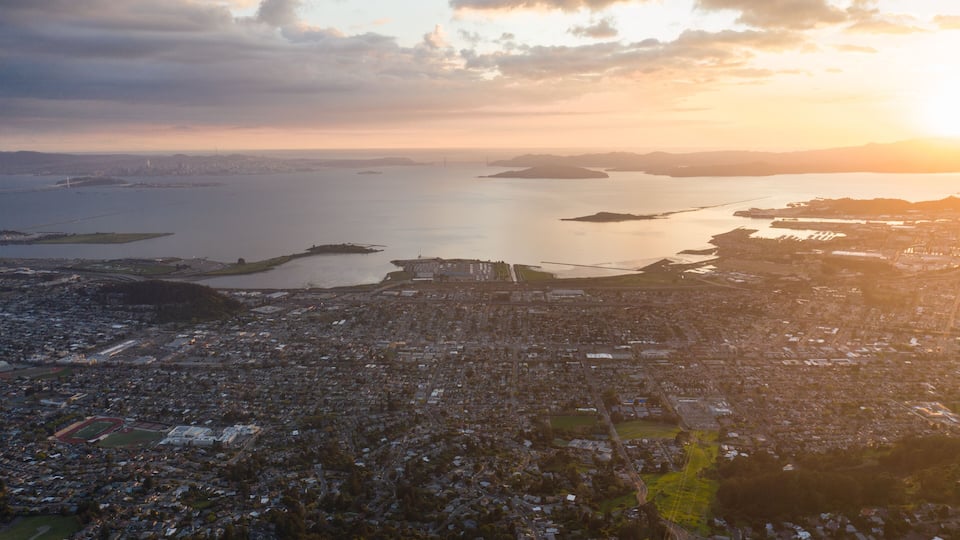 Late evening light shines on the East Bay and San Francisco Bay in Northern California. This region of the west coast is densely populated but is not far from Lake Tahoe and Yosemite National Park.