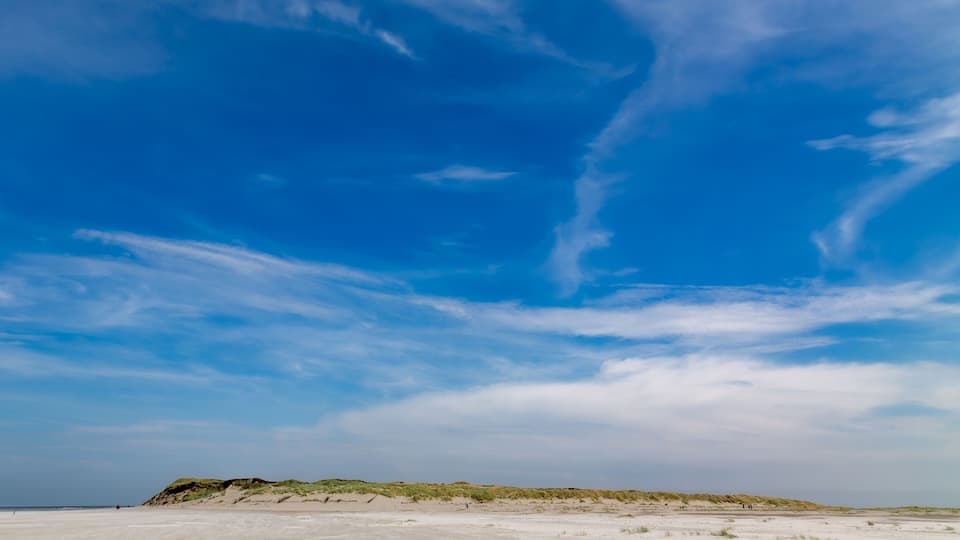 Lonely beach on the west end of the East Frisian island Juist, Germany.