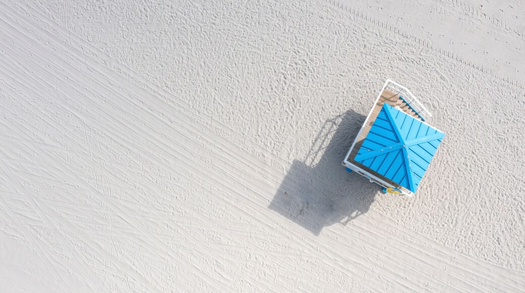 Aerial view of a lifeguard hut on a serene beach with sand and blue sea, Hollywood, United States.