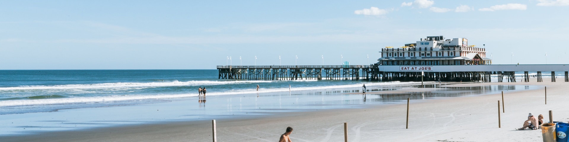Daytona Beach Pier which includes a sandy beach and general coastal views