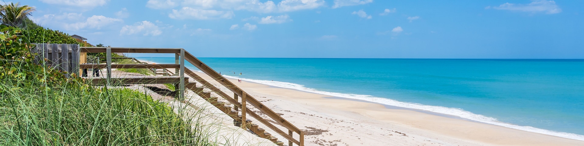 Wooden Boardwalk and Staircase Leading to Atlantic Ocean Beach Side View, Melbourne Beach, Florida, USA