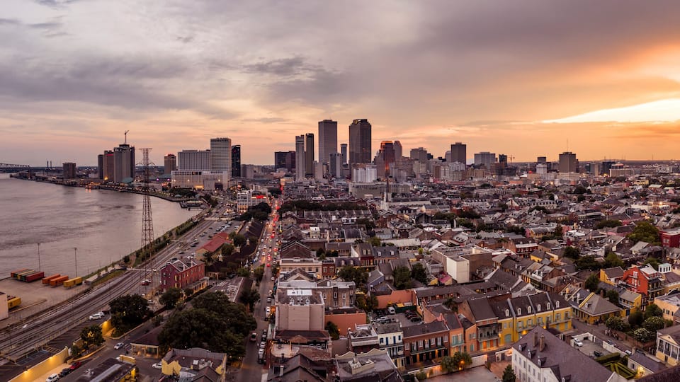Aerial view of urban skyline with skyscrapers and Mississippi River, New Orleans city center, Marigny, Louisiana, United States.