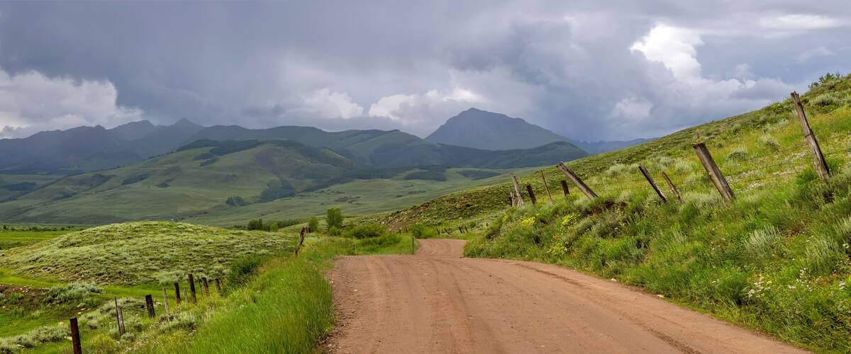 Panoramic view of Rocky mountain landscape in Colorado , Scenic back road through wild flower meadows.