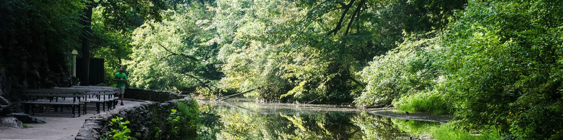 Reflection of trees in water at Natural Bridge State park in Virginia, United States.