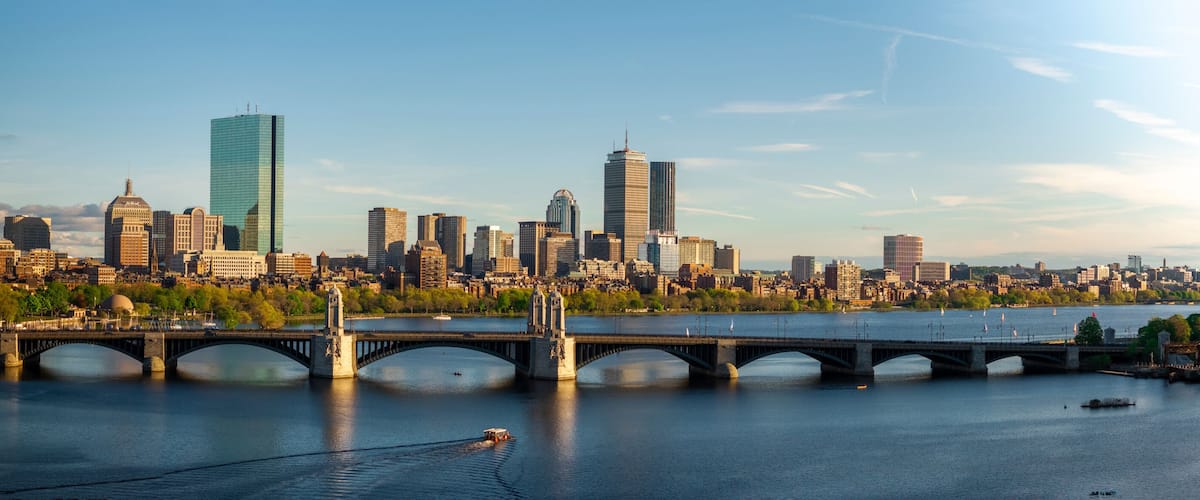 Aerial view of urban skyline with river, bridge, and buildings, cambridge, massachusetts, united states.