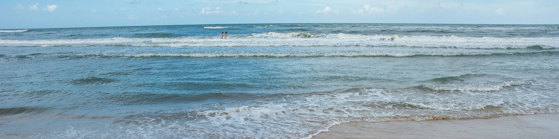Young women in surf at Ormond Beach, FL