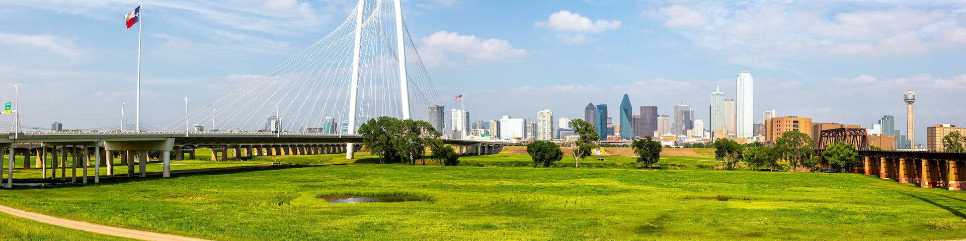 Dallas skyline at Trinity River and Margaret Hunt Hill Bridge panorama in Texas, United States