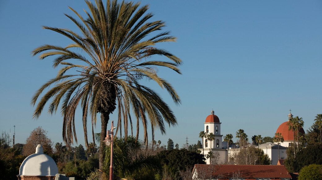 Late afternoon sun shines on the historic Basilica and historic district of San Juan Capistrano, California, USA.