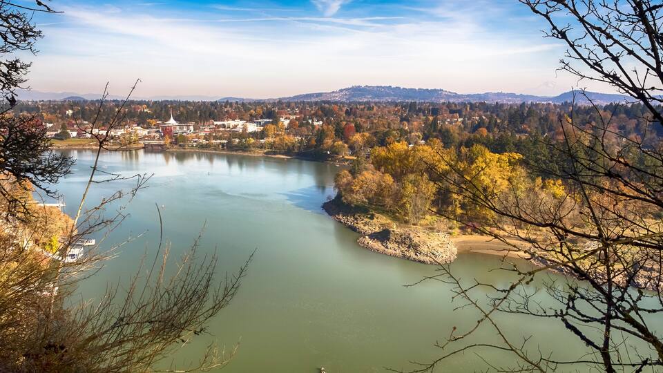 Willamette river in sunny autumn day. View from above. Milwaukie City, Oregon, on the background