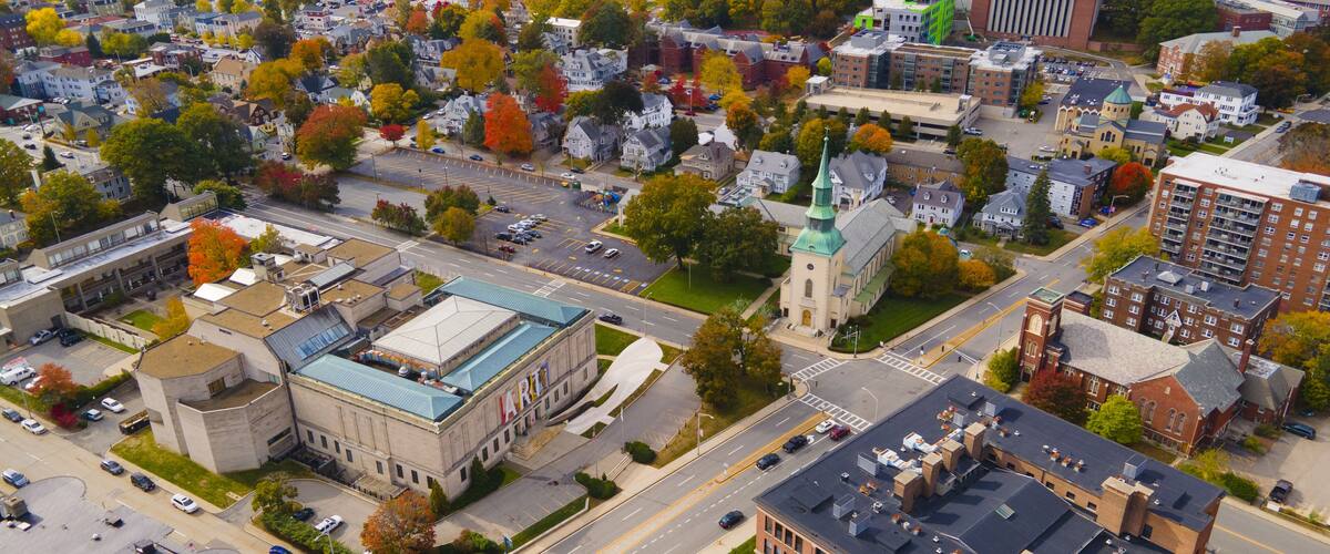 Aerial view of Worcester Art Museum at 55 Salisbury Street and downtown Worcester skyline at the background in fall in Massachusetts MA, USA.