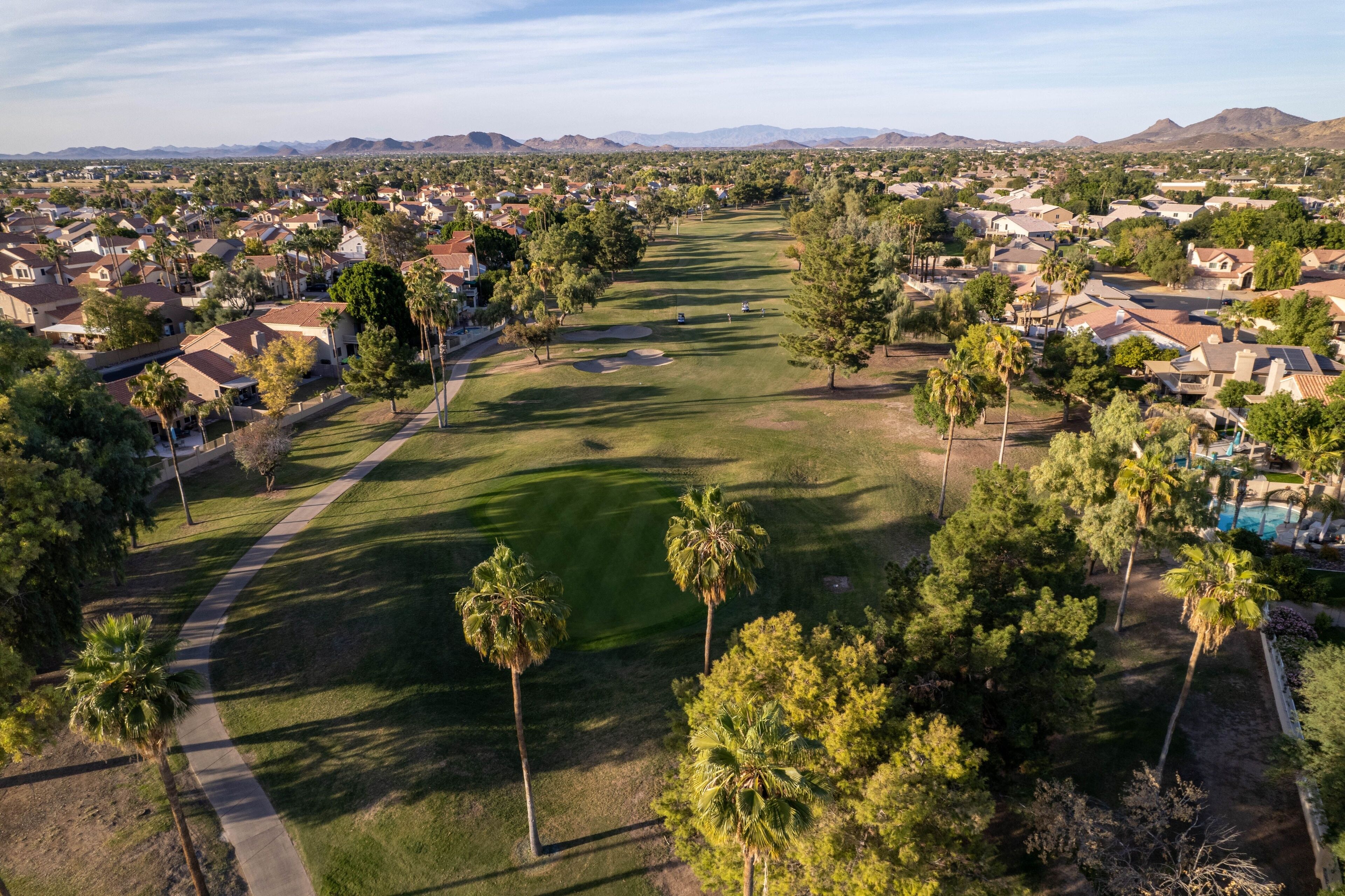 Scenic residential area with green trees. Arrowhead Ranch, Glendale, Arizona, United States