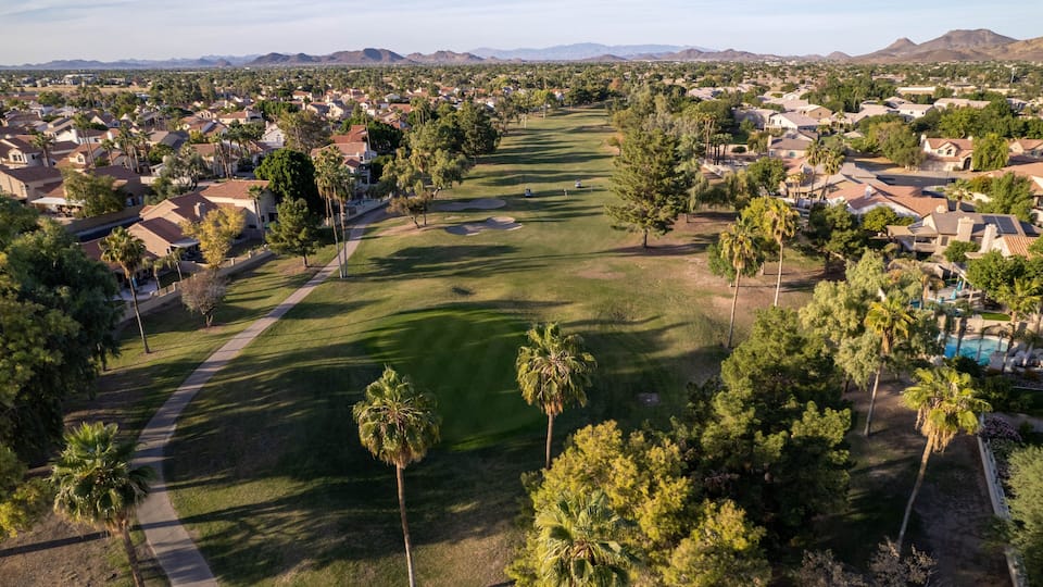 Scenic residential area with green trees. Arrowhead Ranch, Glendale, Arizona, United States