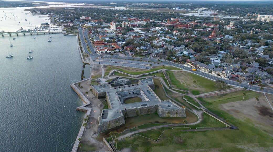 Drone shot of the Castillo de San Marcos National Monument during sunrise.
