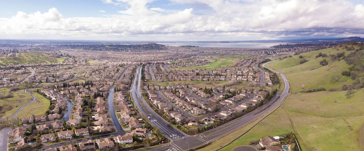 180 Degree aerial panorama of Folsom, California and Folsom Lake