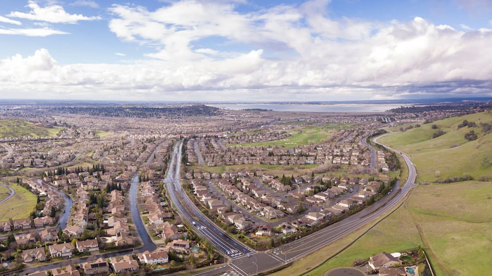180 Degree aerial panorama of Folsom, California and Folsom Lake