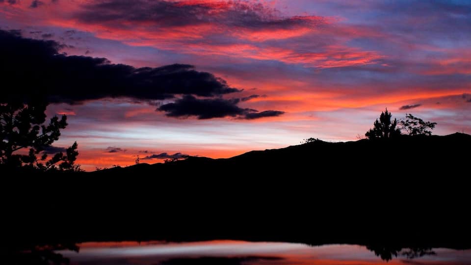 I was at Las Brisas Park TIL sundown and as the last rays of the sun gleamed, I took a shot of the #red skies and and the reflection of the sky appeared in my car’s roof.