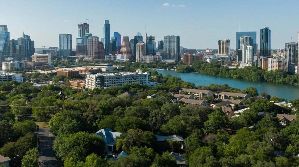 Travis Heights which includes landscape views and a city