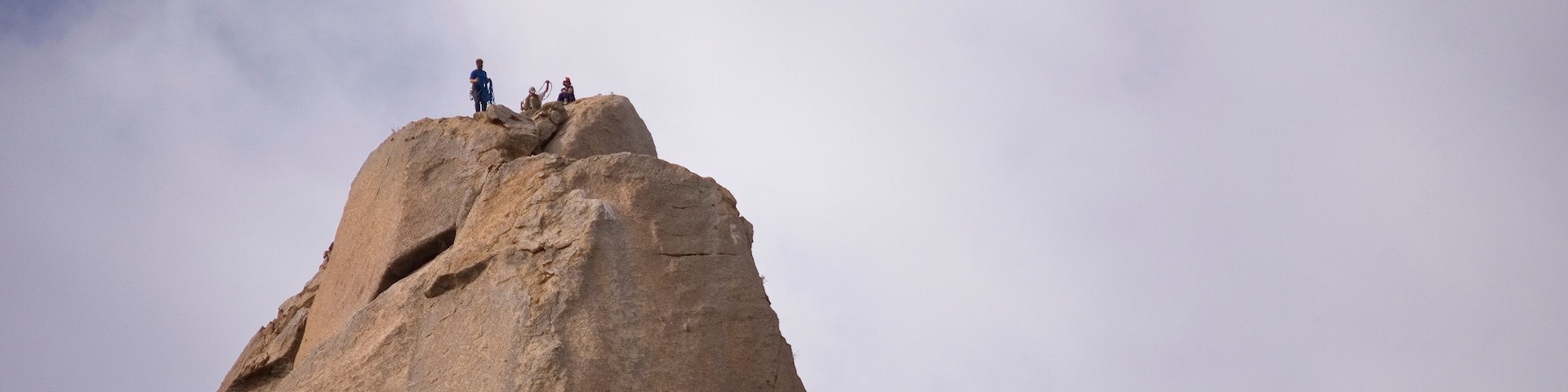 Pinnacle Peak with Four Climbers and Haze