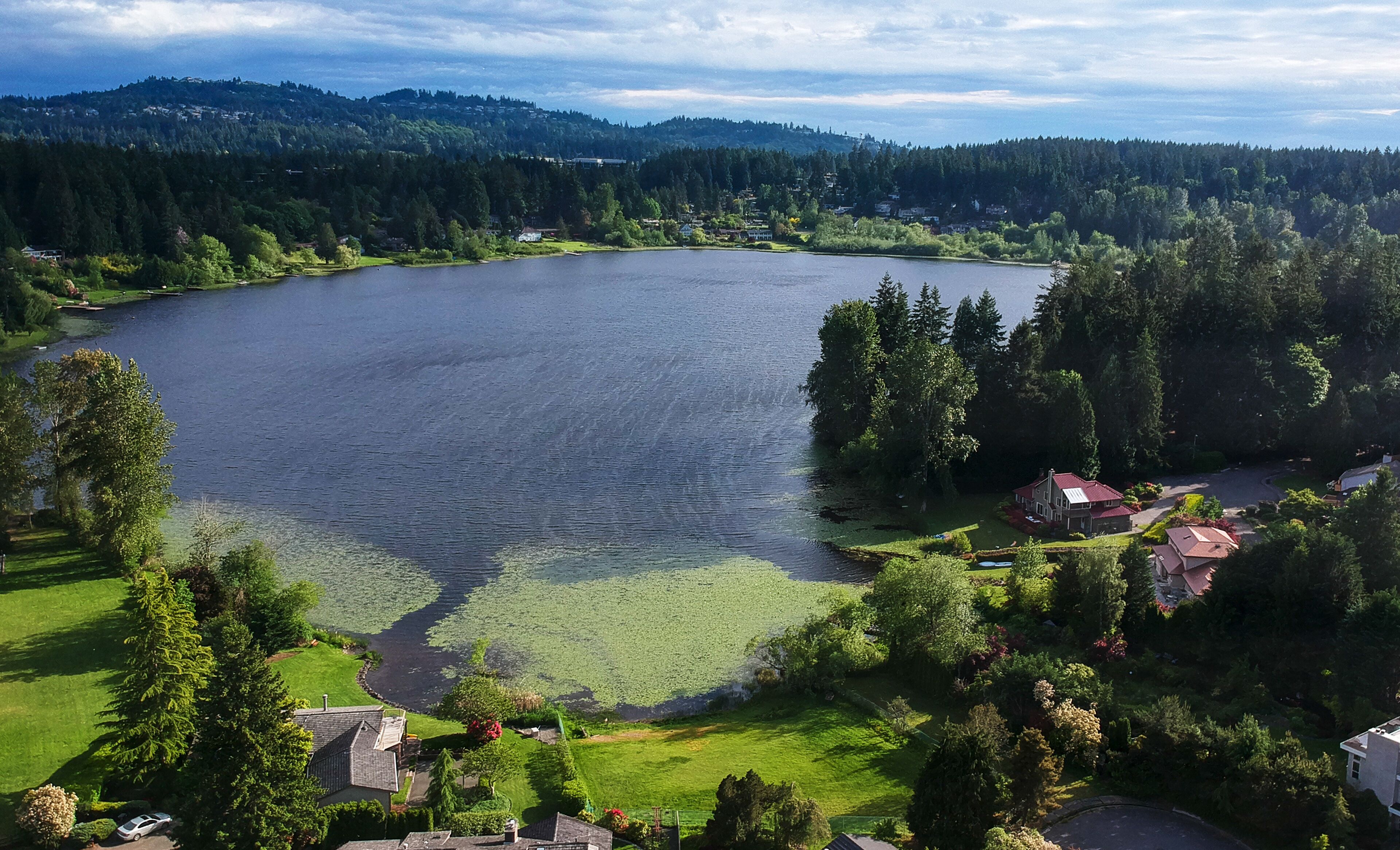 Picturesque Phantom Lake and the surrounding sprawling communities of Robinswood, Lake Hill and West Lake Sammamish in Bellevue, Washington.