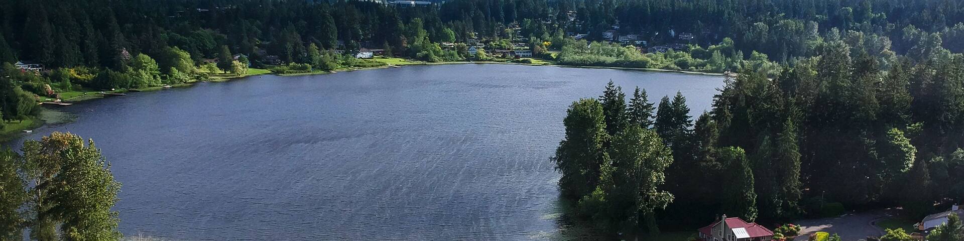 Picturesque Phantom Lake and the surrounding sprawling communities of Robinswood, Lake Hill and West Lake Sammamish in Bellevue, Washington.