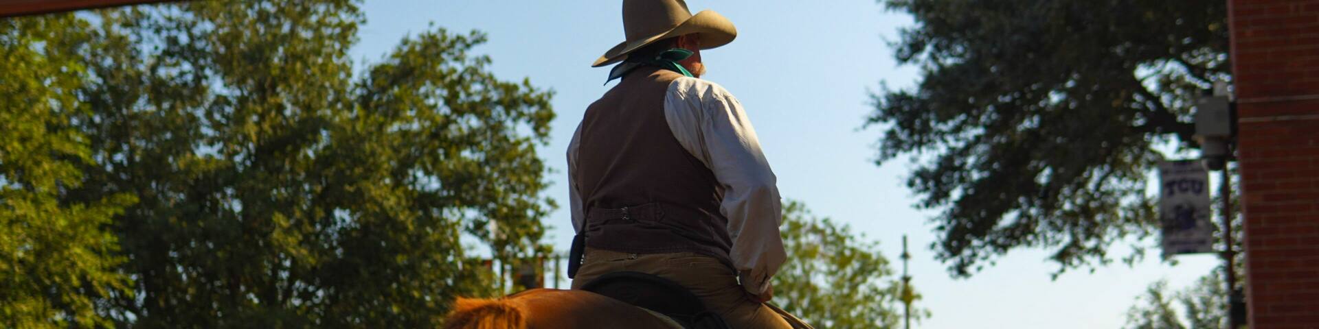 Cowboy riding a horse at the Fort Worth Stockyards, Texas USA