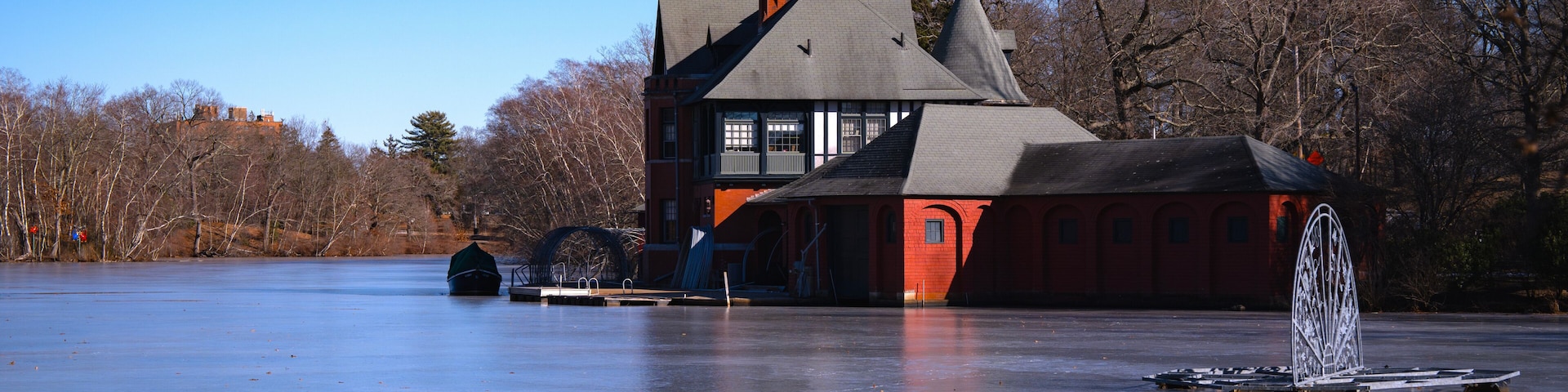 Landmark boathouse and pavilions over Polo Lake at Roger Williams Park, Providence, Rhode Island, USA