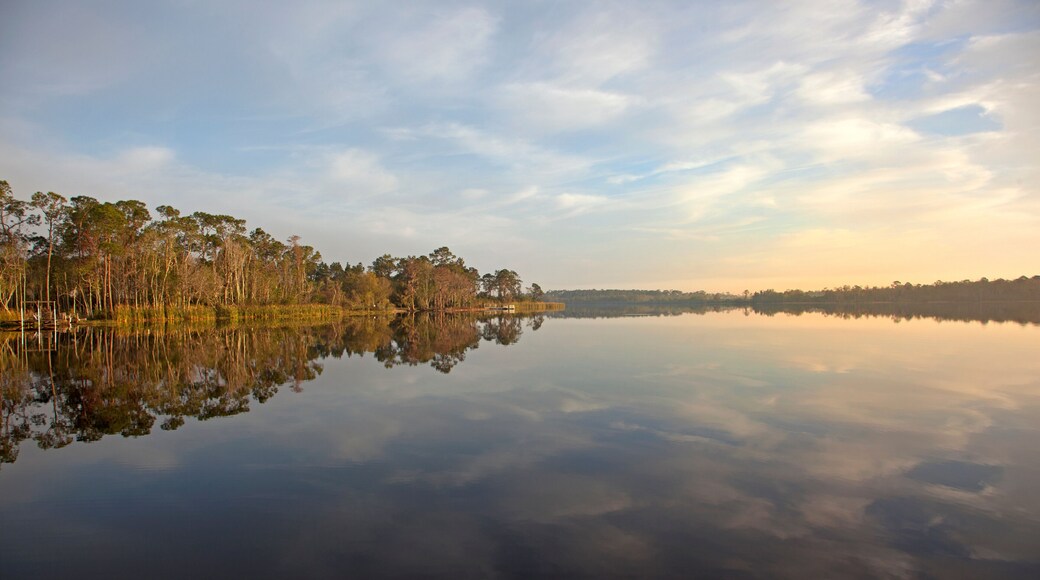 reflection over lake with sunrise