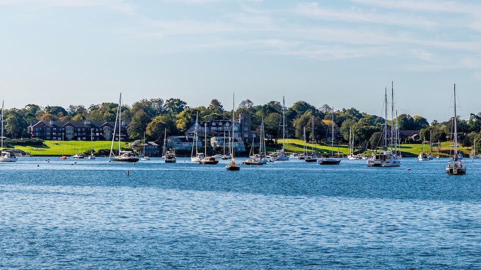 A panorama view of boats moored in Narragansett bay in Newport, USA in the fall
