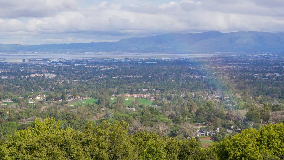 View towards south San Francisco bay after a storm; landscape with rainbow, California