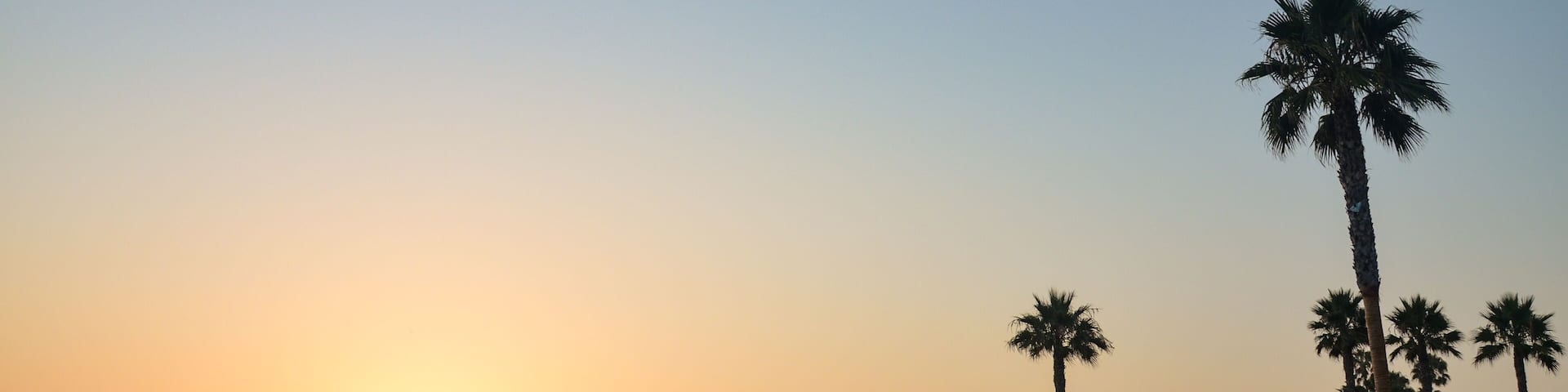 Beautiful colourful summer sunset behind the valley of the San Luis Obispo Bay, viewed from South Palisades Park in Pismo Beach, California