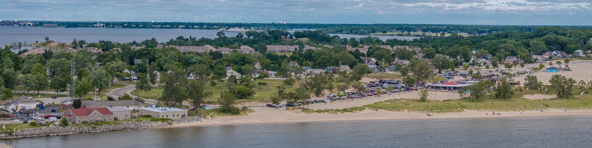 Aerial View of the Muskegon South Pier head Lighthouse and Lake Michigan Shoreline Muskegon, Michigan, USA