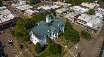 JULY 8, 2023, OXFORD, MS., USA - town courthouse and surrounding stores in historic ole' Miss hometown of University and symbol of south