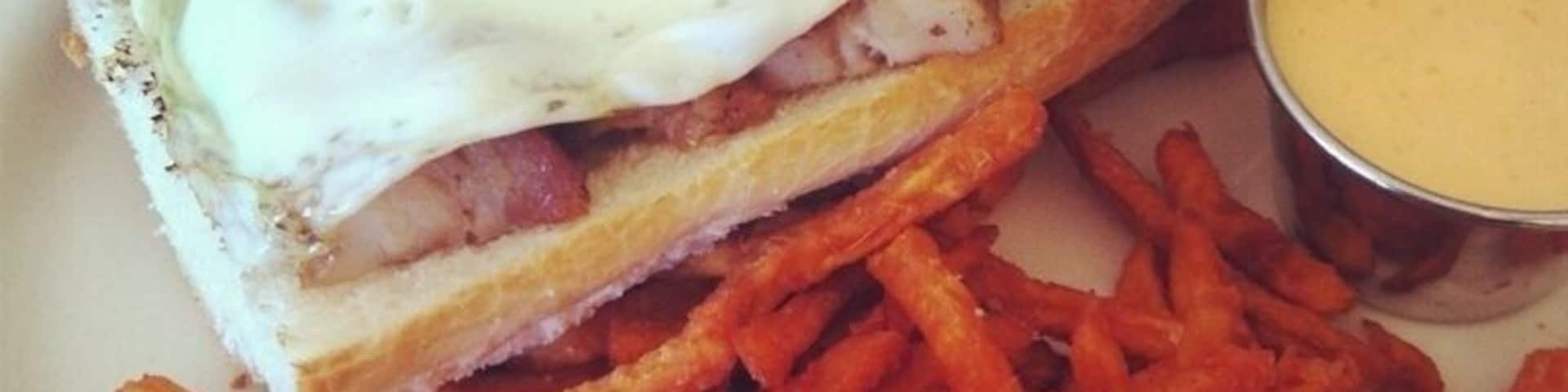 Organic, local food at Ngon Vietnamese Bistro on University Ave in Frogtown area of St. Paul. This is the Croque Madame with sweet potato frites, but the Bahn Mi sandwich was also the best I've ever had! www.bradleyhanson.com