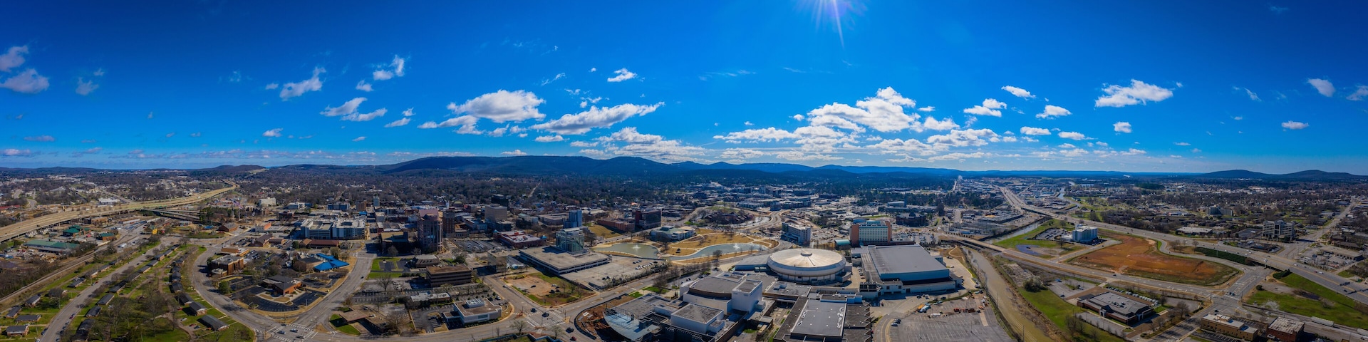 Aerial panoramic view of downtown Huntsville Al flanked by Hwy 231 and Hwy 565.