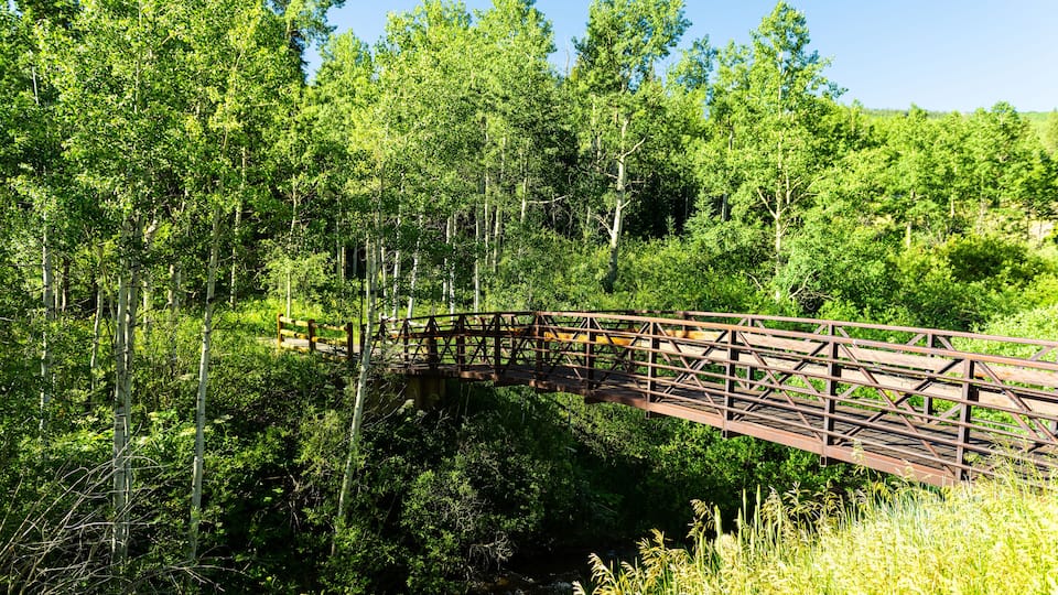 Snowmass Aspen village town at Brush Creek trail in Colorado downtown with bridge and nobody in summer view
