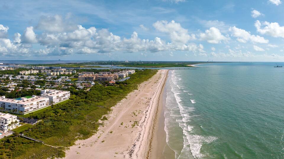 Aerial view of Cocoa Beach - Cape Canaveral and the ocean. June 27, 2022